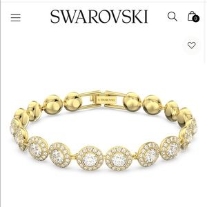 gelic bracelet- SWAROVSKI 
Round cut, White, Gold-tone plated